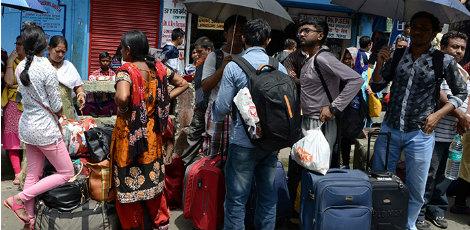 Cerca de 7.000 turistas deixaram a cidade neste fim de semana / AFP